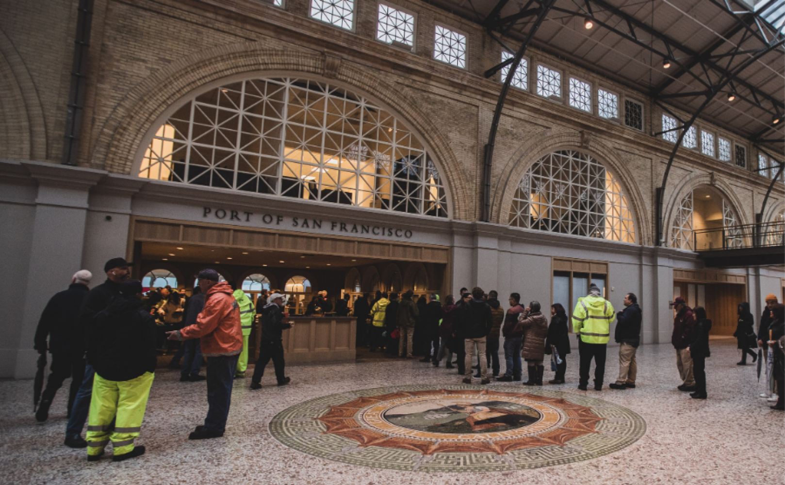 People line up outside a meeting room in the Ferry Building
