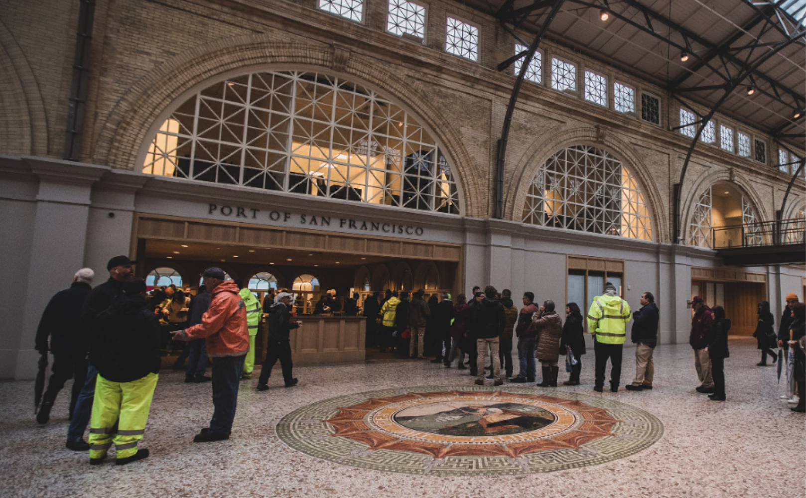 People line up outside a meeting room in the Ferry Building