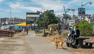 People sitting at Agua Vista Park