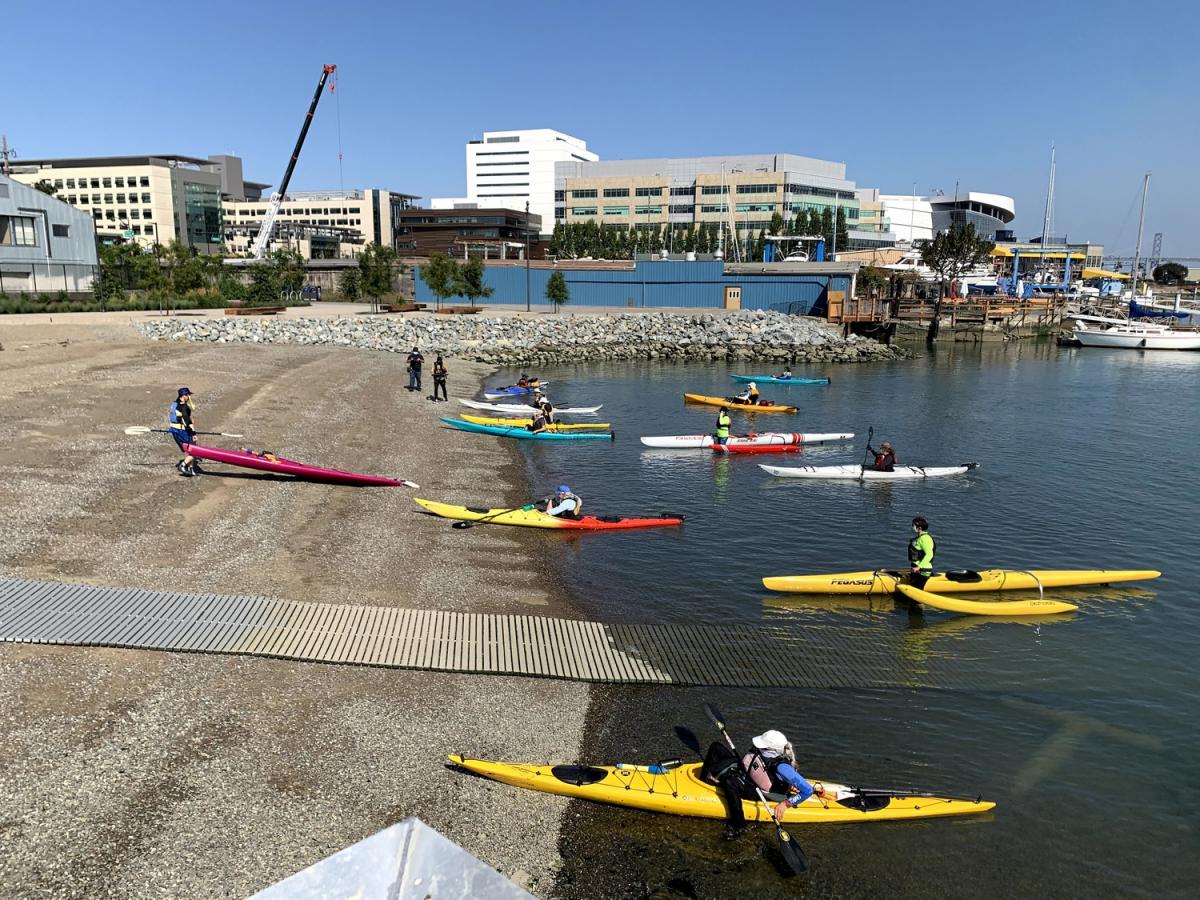 img_3187.jpg Colorful kayaks prepare to paddle into the open water at the beach at Crane Cove Park.