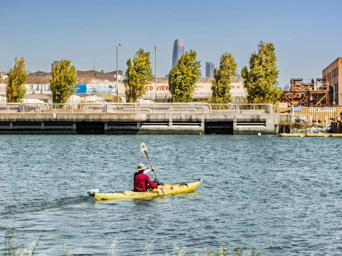 Kayaker paddles in Islais Creek