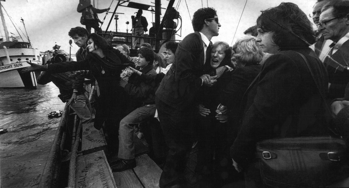The widow of skipper Jack Favalora, surrounded by her children and Vincenzo Ingargiola’s family. The “Jack2” went down with its skipper and crew in dense fog off the coast of Point Reyes National Seashore in 1986. 