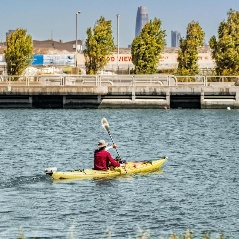 Kayaker paddles in Islais Creek